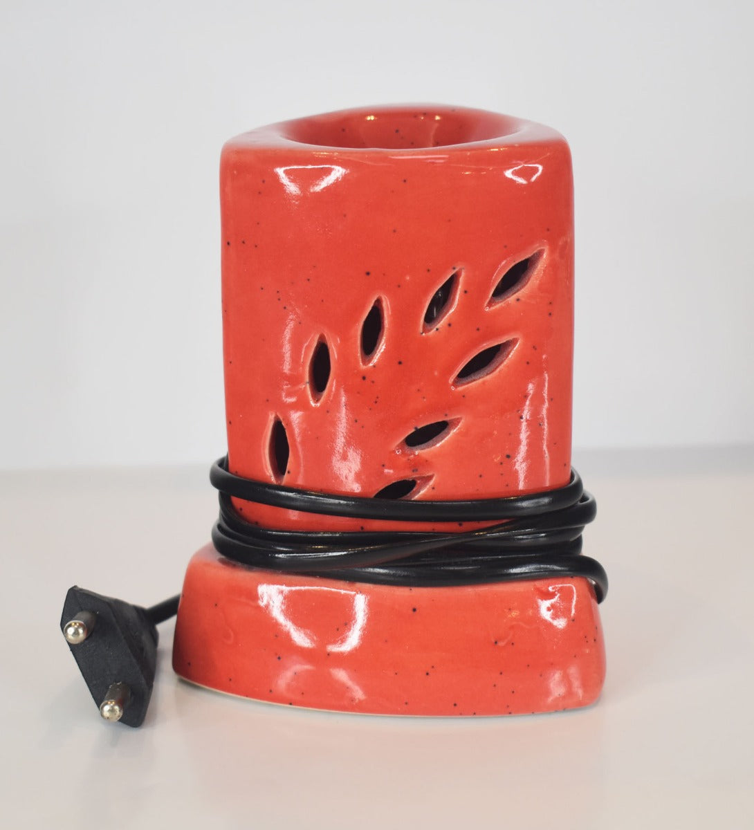 Triangular Cylinder Leaf Cut Electric Ceramic Burner by Song of India — product packaging detail