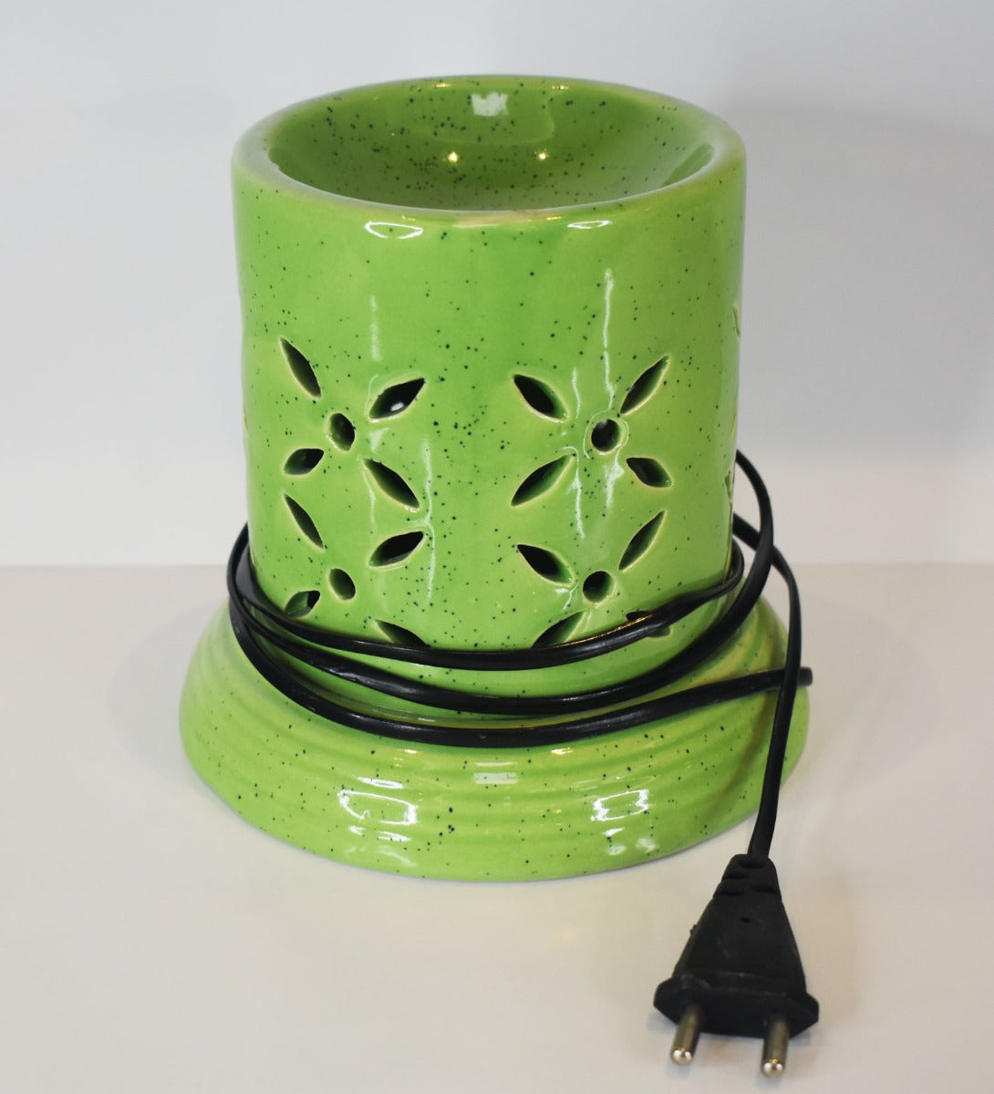 Cylindrical Podium Leaf Cut Electric Ceramic Burner by Song of India — primary product image