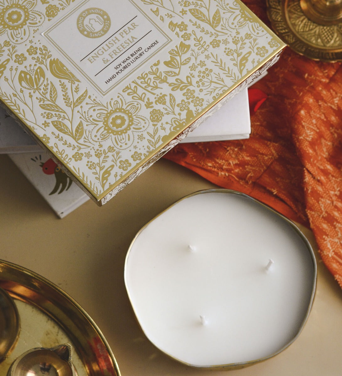English Pear & Freesia Festive Luxe Scented Candle by Song of India — soy wax candle jar and packaging detail