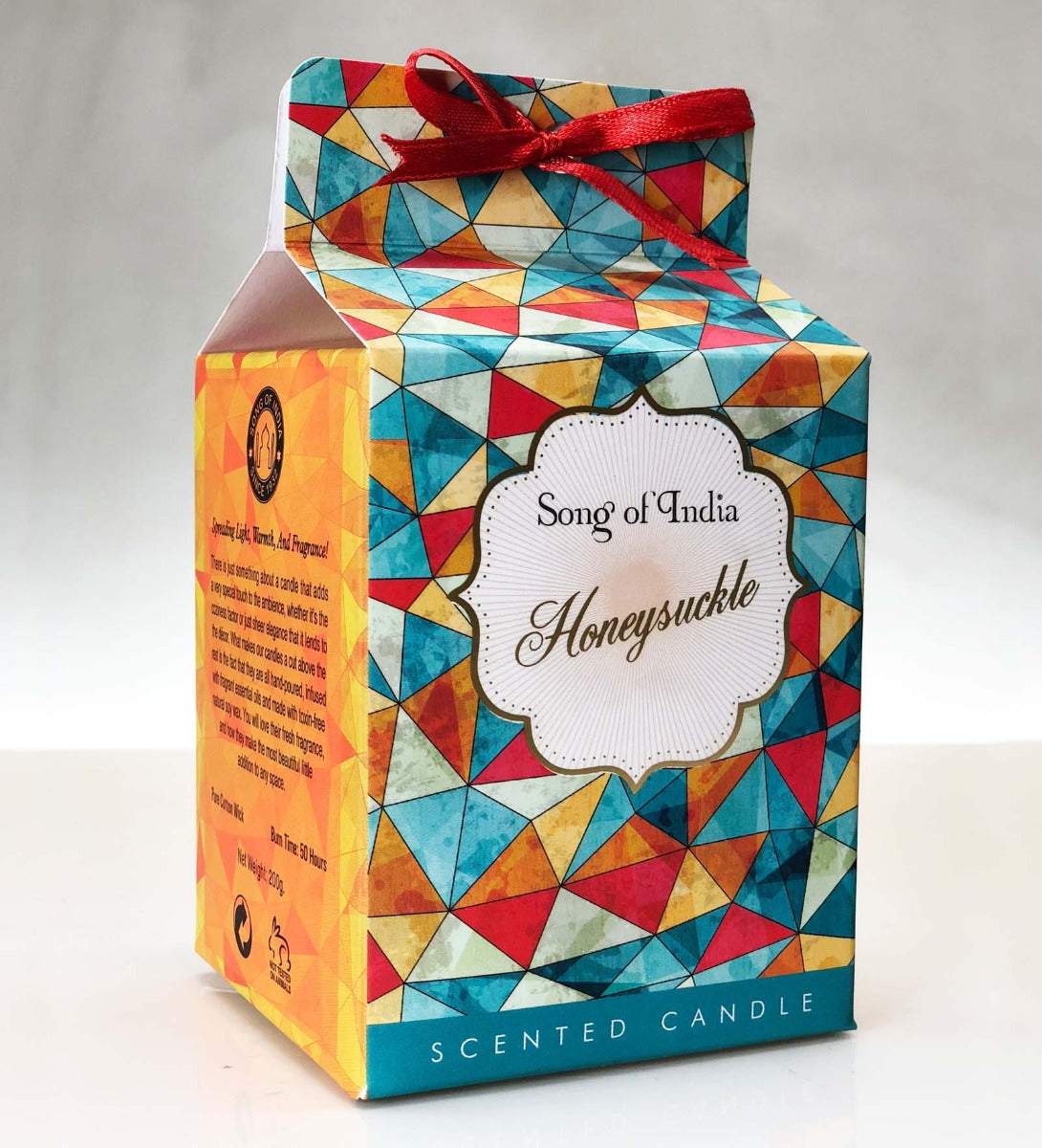 Honeysuckle Soy Wax Candle by Song of India — candle fragrance and label detail