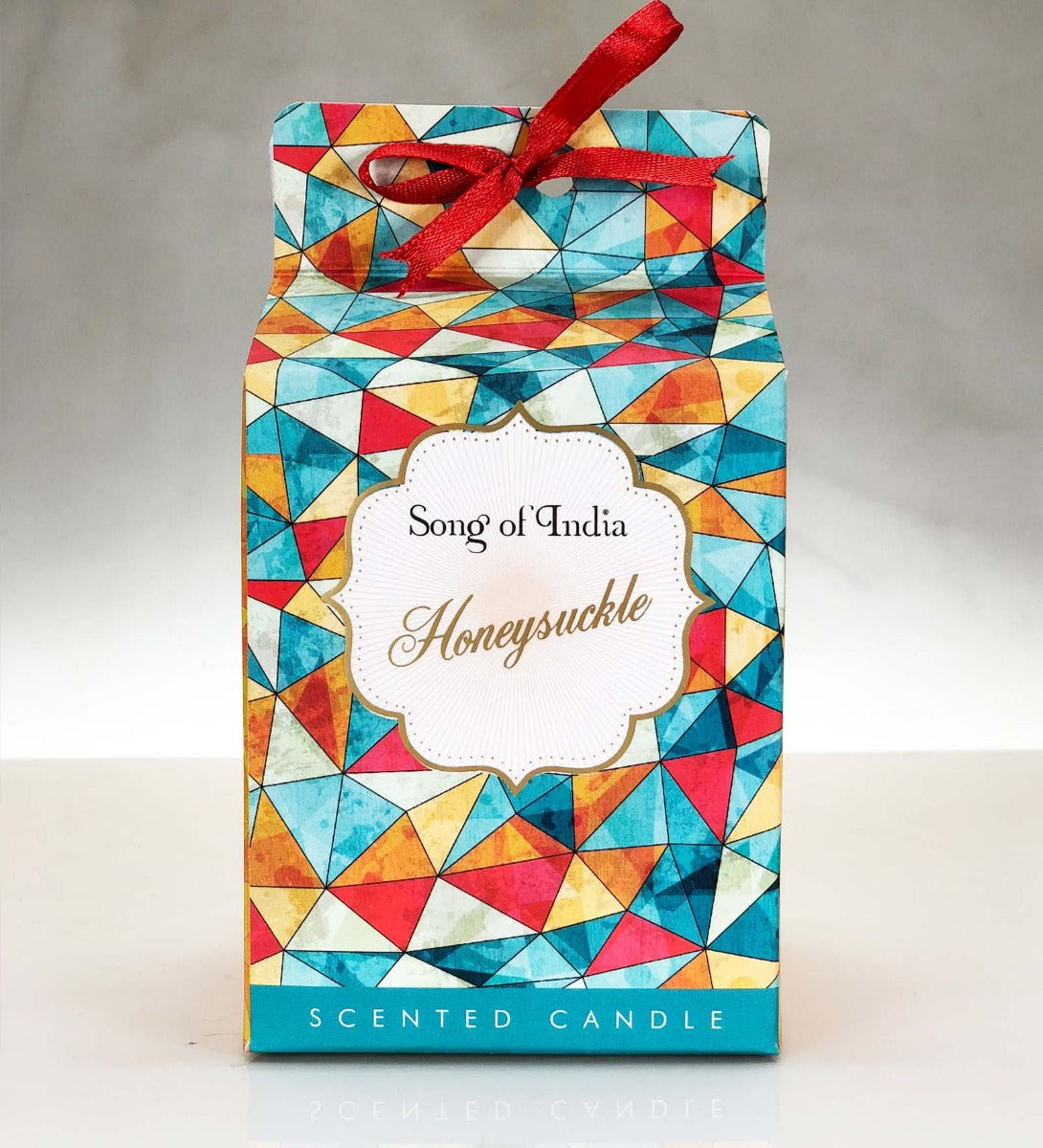 Honeysuckle Soy Wax Candle by Song of India — lifestyle candle setting