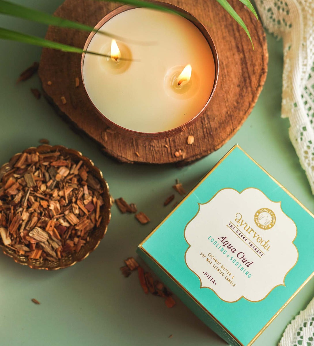 Aqua Oud Scented Candle by Song of India — soy wax candle jar and packaging detail