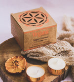Nagpuri Narangi - Orange Organic Tea Light Candle (Set of 12) by Song of India — primary product image